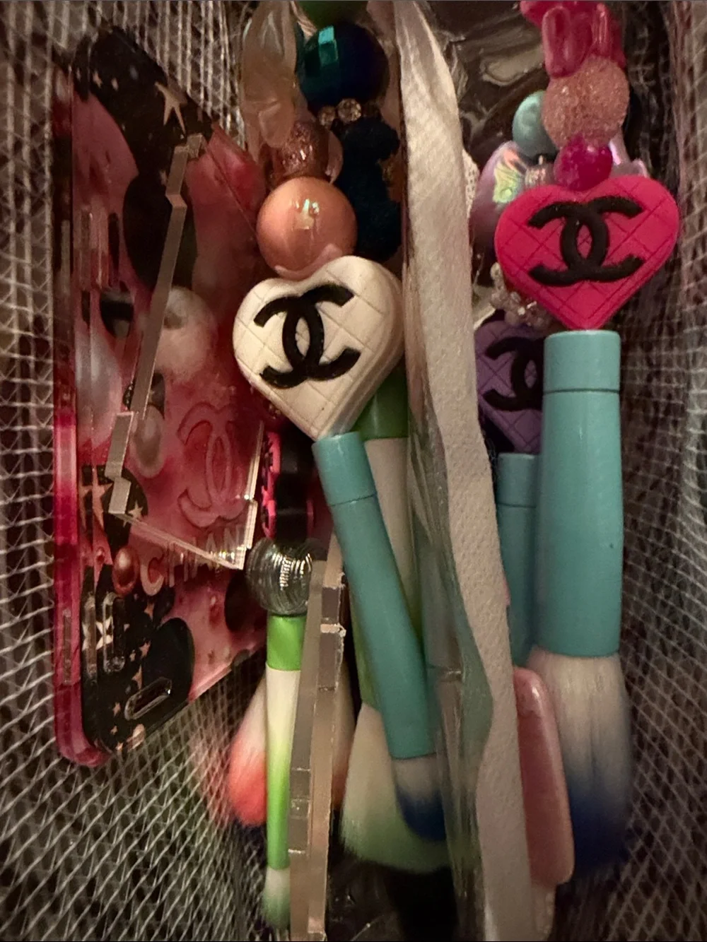 Pen/pencil or makeup brush holder along with brushes and pen and cosmetic case